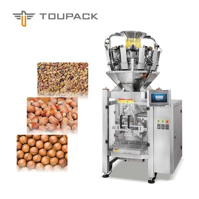 tudo no peso um e na máquina de embalagem do chocolate que envolvem o alimento de petisco